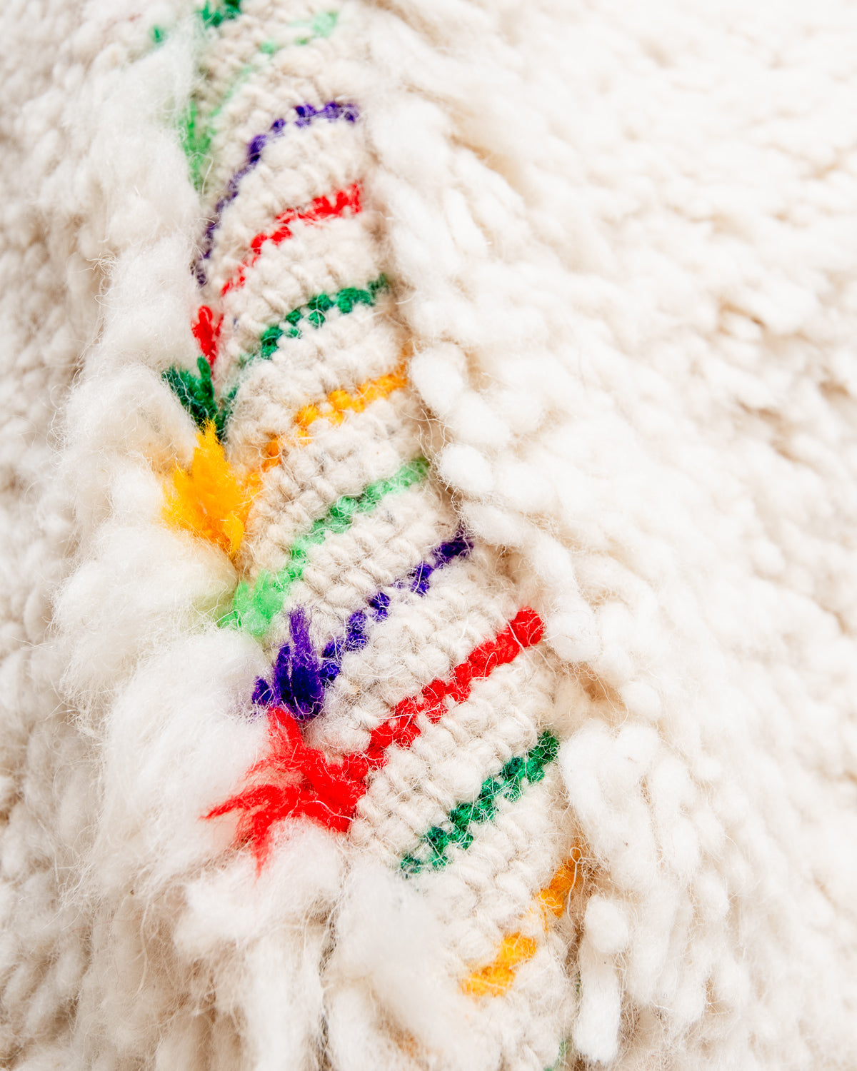 Modern, designer, handcrafted Berber rug from Morocco. Beniourain carpet with beautiful colours and patterns and fluffy wool texture.